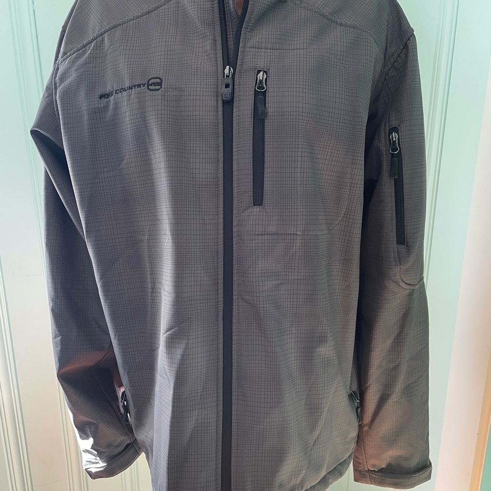 Men’s brand new free country winter jacket ( no tags) xl
